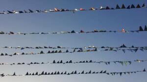 Pennant garlands against a blue sky